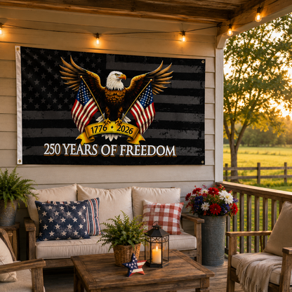 Decorative banner celebrating 250 years of freedom on a porch with American flags and an eagle.